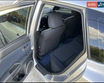 Серый Мазда 3, объемом двигателя 2 л и пробегом 191 тыс. км за 4100 $, фото 7 на Automoto.ua