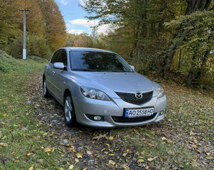 Серый Мазда 3, объемом двигателя 1.6 л и пробегом 248 тыс. км за 4800 $, фото 1 на Automoto.ua