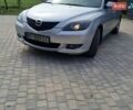 Серый Мазда 3, объемом двигателя 1.6 л и пробегом 290 тыс. км за 2950 $, фото 1 на Automoto.ua