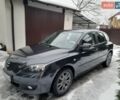 Сірий Мазда 3, об'ємом двигуна 1.56 л та пробігом 246 тис. км за 4200 $, фото 1 на Automoto.ua