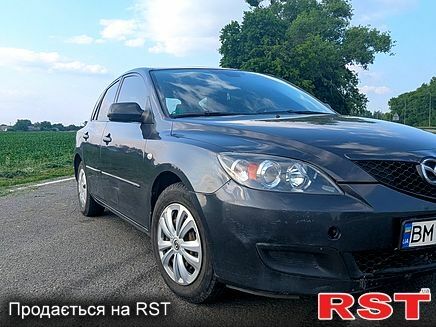 Серый Мазда 3, объемом двигателя 1.3 л и пробегом 180 тыс. км за 3200 $, фото 1 на Automoto.ua