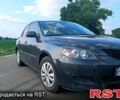 Серый Мазда 3, объемом двигателя 1.3 л и пробегом 180 тыс. км за 3200 $, фото 1 на Automoto.ua