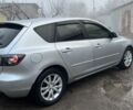 Серый Мазда 3, объемом двигателя 1.6 л и пробегом 313 тыс. км за 5400 $, фото 3 на Automoto.ua