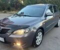 Серый Мазда 3, объемом двигателя 1.6 л и пробегом 217 тыс. км за 5400 $, фото 1 на Automoto.ua