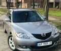 Серый Мазда 3, объемом двигателя 1.56 л и пробегом 179 тыс. км за 5450 $, фото 1 на Automoto.ua