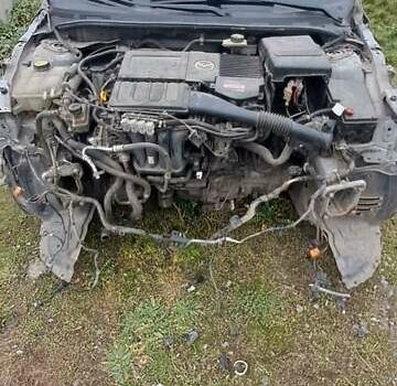 Серый Мазда 3, объемом двигателя 1.6 л и пробегом 370 тыс. км за 2200 $, фото 3 на Automoto.ua