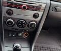 Сірий Мазда 3, об'ємом двигуна 2 л та пробігом 245 тис. км за 4500 $, фото 9 на Automoto.ua