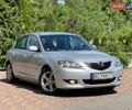Серый Мазда 3, объемом двигателя 1.6 л и пробегом 215 тыс. км за 3200 $, фото 1 на Automoto.ua