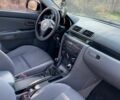 Серый Мазда 3, объемом двигателя 1.3 л и пробегом 213 тыс. км за 3999 $, фото 5 на Automoto.ua