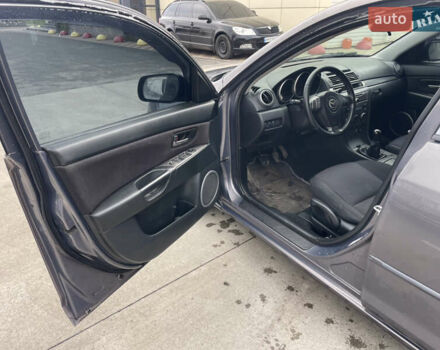 Серый Мазда 3, объемом двигателя 2 л и пробегом 299 тыс. км за 4300 $, фото 12 на Automoto.ua