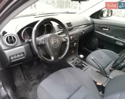 Серый Мазда 3, объемом двигателя 1.6 л и пробегом 242 тыс. км за 4500 $, фото 3 на Automoto.ua