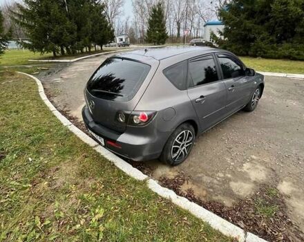 Серый Мазда 3, объемом двигателя 2 л и пробегом 302 тыс. км за 4200 $, фото 4 на Automoto.ua
