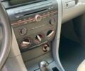 Сірий Мазда 3, об'ємом двигуна 1.4 л та пробігом 305 тис. км за 5340 $, фото 16 на Automoto.ua