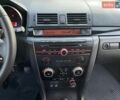Сірий Мазда 3, об'ємом двигуна 1.6 л та пробігом 310 тис. км за 3800 $, фото 10 на Automoto.ua