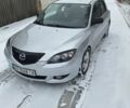Серый Мазда 3, объемом двигателя 1.6 л и пробегом 228 тыс. км за 4499 $, фото 1 на Automoto.ua