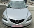 Серый Мазда 3, объемом двигателя 1.6 л и пробегом 223 тыс. км за 5100 $, фото 1 на Automoto.ua