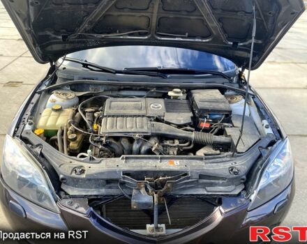 Серый Мазда 3, объемом двигателя 1.6 л и пробегом 282 тыс. км за 6000 $, фото 7 на Automoto.ua