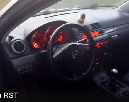 Серый Мазда 3, объемом двигателя 2 л и пробегом 230 тыс. км за 3100 $, фото 3 на Automoto.ua