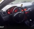 Серый Мазда 3, объемом двигателя 2 л и пробегом 230 тыс. км за 3100 $, фото 3 на Automoto.ua