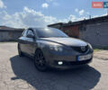 Серый Мазда 3, объемом двигателя 1.6 л и пробегом 233 тыс. км за 6000 $, фото 1 на Automoto.ua