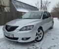 Серый Мазда 3, объемом двигателя 1.6 л и пробегом 228 тыс. км за 4499 $, фото 2 на Automoto.ua
