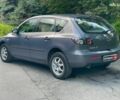 Сірий Мазда 3, об'ємом двигуна 1.4 л та пробігом 305 тис. км за 5340 $, фото 7 на Automoto.ua