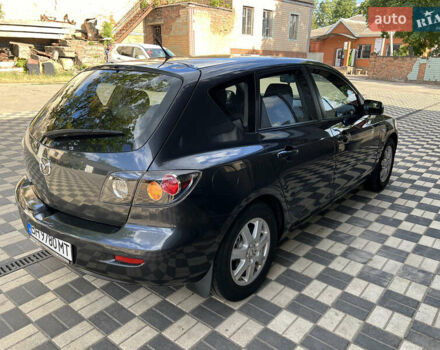 Серый Мазда 3, объемом двигателя 1.6 л и пробегом 305 тыс. км за 5300 $, фото 3 на Automoto.ua