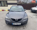 Серый Мазда 3, объемом двигателя 2 л и пробегом 299 тыс. км за 4300 $, фото 1 на Automoto.ua