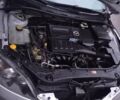 Серый Мазда 3, объемом двигателя 1.6 л и пробегом 140 тыс. км за 3900 $, фото 4 на Automoto.ua