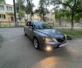Серый Мазда 3, объемом двигателя 1.6 л и пробегом 250 тыс. км за 1950 $, фото 1 на Automoto.ua