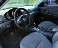 Сірий Мазда 3, об'ємом двигуна 1.6 л та пробігом 231 тис. км за 4900 $, фото 4 на Automoto.ua