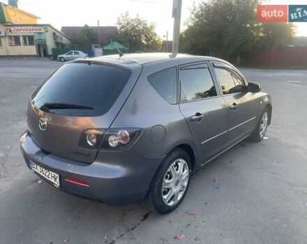 Серый Мазда 3, объемом двигателя 2 л и пробегом 300 тыс. км за 6500 $, фото 3 на Automoto.ua