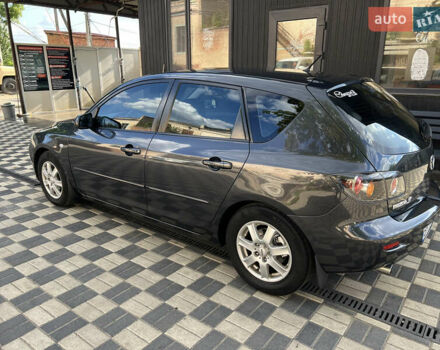 Серый Мазда 3, объемом двигателя 1.6 л и пробегом 305 тыс. км за 5300 $, фото 5 на Automoto.ua