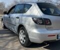 Серый Мазда 3, объемом двигателя 1.3 л и пробегом 213 тыс. км за 3999 $, фото 3 на Automoto.ua