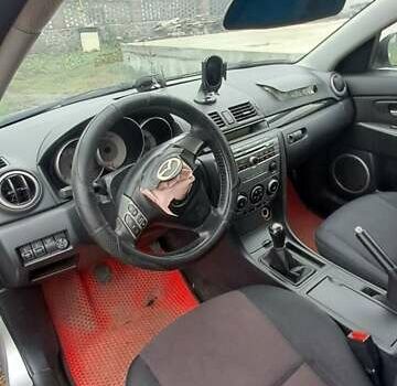 Серый Мазда 3, объемом двигателя 1.6 л и пробегом 370 тыс. км за 2200 $, фото 8 на Automoto.ua