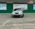 Серый Мазда 3, объемом двигателя 1.56 л и пробегом 229 тыс. км за 4500 $, фото 1 на Automoto.ua