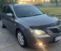 Серый Мазда 3, объемом двигателя 1.6 л и пробегом 217 тыс. км за 5400 $, фото 1 на Automoto.ua