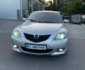 Серый Мазда 3, объемом двигателя 1.61 л и пробегом 259 тыс. км за 4500 $, фото 1 на Automoto.ua