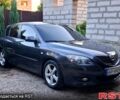 Серый Мазда 3, объемом двигателя 1.6 л и пробегом 244 тыс. км за 4500 $, фото 1 на Automoto.ua