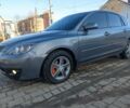 Серый Мазда 3, объемом двигателя 1.6 л и пробегом 217 тыс. км за 5499 $, фото 2 на Automoto.ua