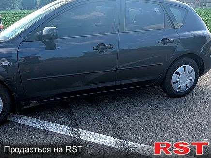 Серый Мазда 3, объемом двигателя 1.3 л и пробегом 180 тыс. км за 3200 $, фото 2 на Automoto.ua