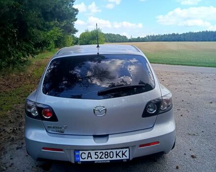 Серый Мазда 3, объемом двигателя 1.6 л и пробегом 254 тыс. км за 4800 $, фото 1 на Automoto.ua