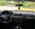 Сірий Мазда 3, об'ємом двигуна 1.56 л та пробігом 247 тис. км за 6700 $, фото 1 на Automoto.ua