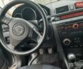 Сірий Мазда 3, об'ємом двигуна 1.56 л та пробігом 188 тис. км за 5620 $, фото 3 на Automoto.ua