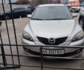 Серый Мазда 3, объемом двигателя 1.6 л и пробегом 180 тыс. км за 4200 $, фото 1 на Automoto.ua
