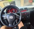 Серый Мазда 3, объемом двигателя 2 л и пробегом 221 тыс. км за 4900 $, фото 1 на Automoto.ua