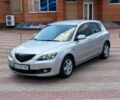Серый Мазда 3, объемом двигателя 1.6 л и пробегом 287 тыс. км за 3999 $, фото 1 на Automoto.ua