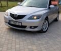 Серый Мазда 3, объемом двигателя 1.6 л и пробегом 290 тыс. км за 2950 $, фото 1 на Automoto.ua