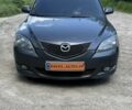 Серый Мазда 3, объемом двигателя 1.6 л и пробегом 247 тыс. км за 2598 $, фото 1 на Automoto.ua