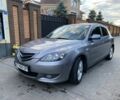 Серый Мазда 3, объемом двигателя 1.6 л и пробегом 242 тыс. км за 5700 $, фото 1 на Automoto.ua